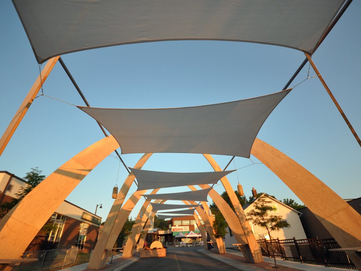 Rectangle sails strung between timber arches